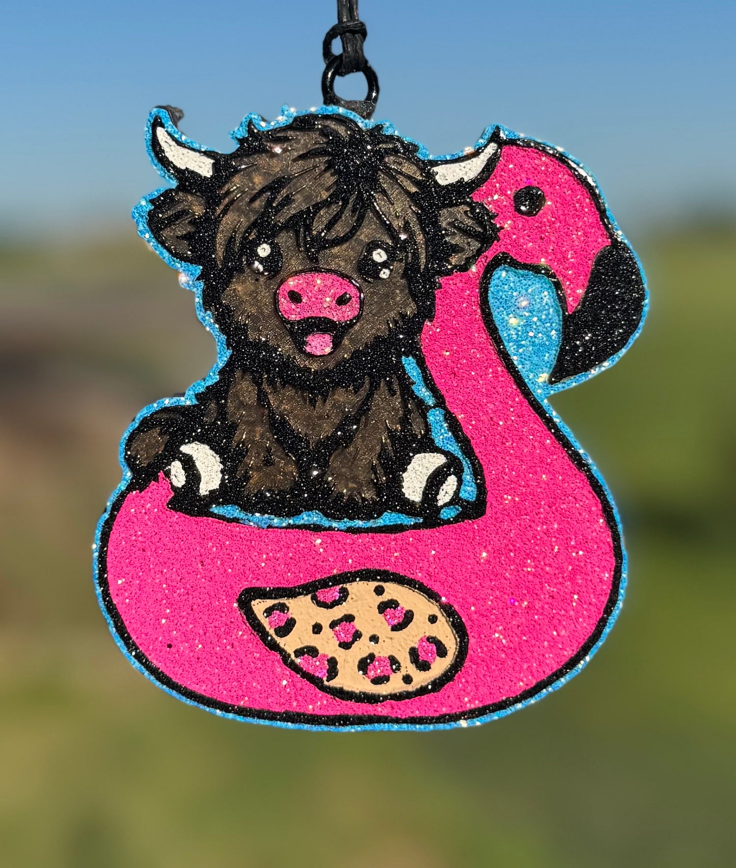 Highland in Flamingo Floatie