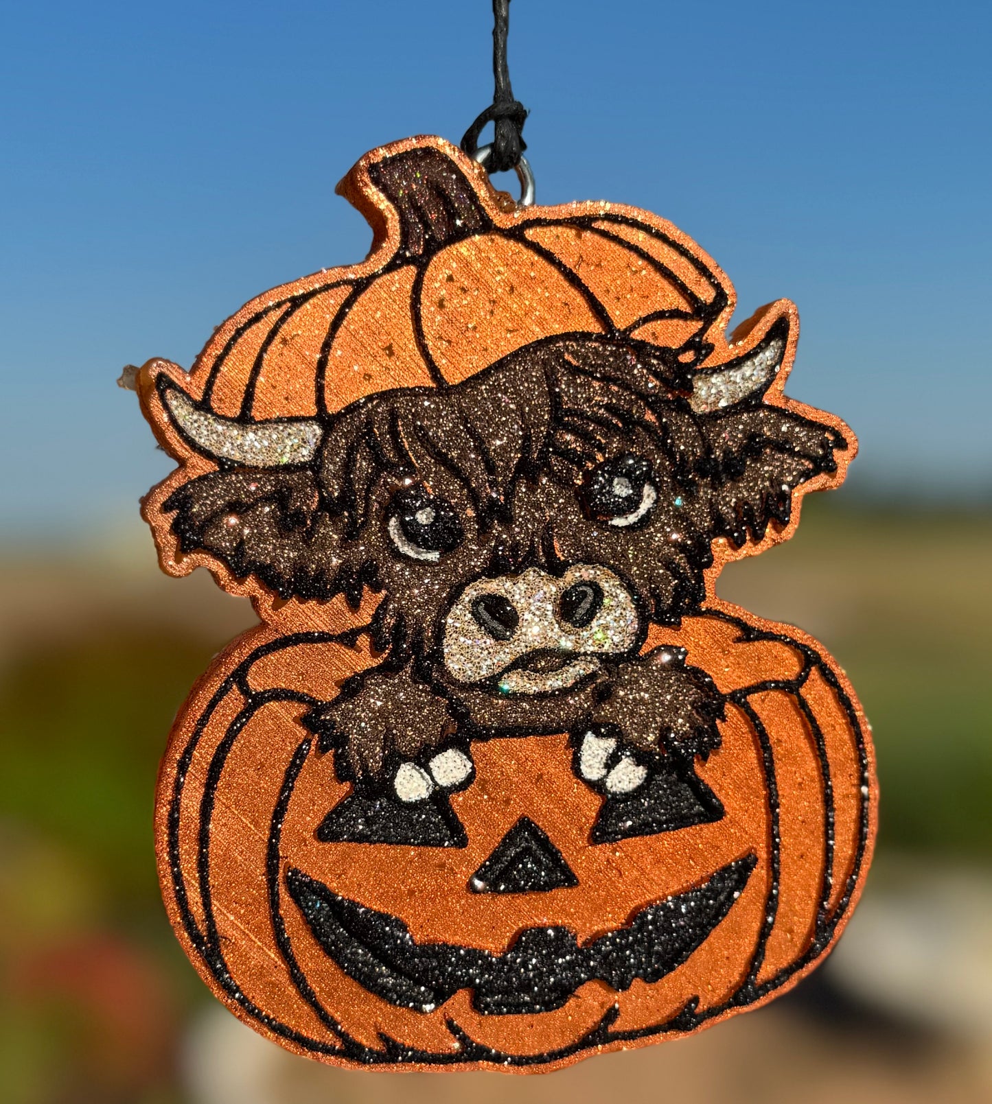 Highland Cow in Jack-O-Lantern