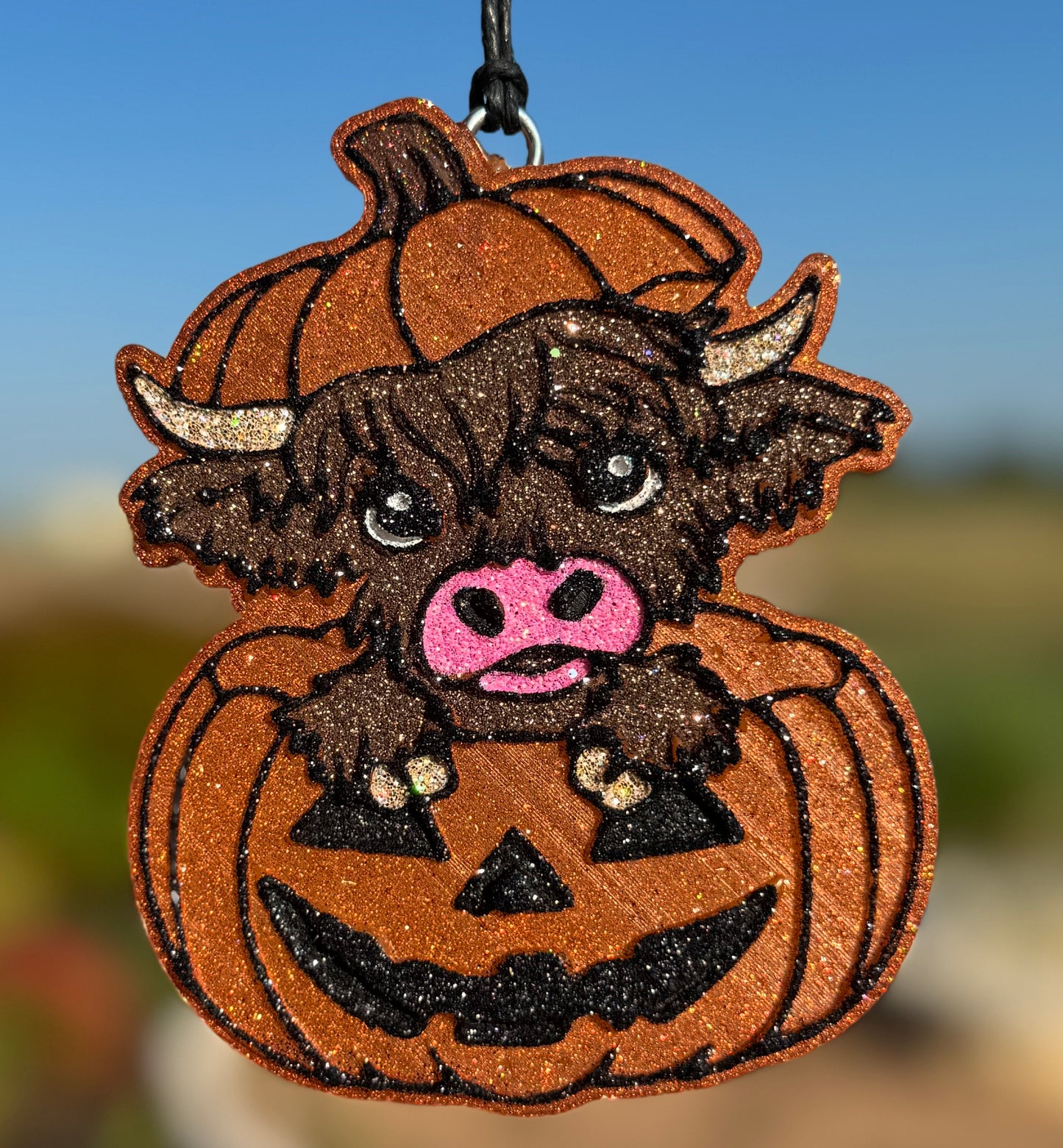 Highland Cow in Jack-O-Lantern
