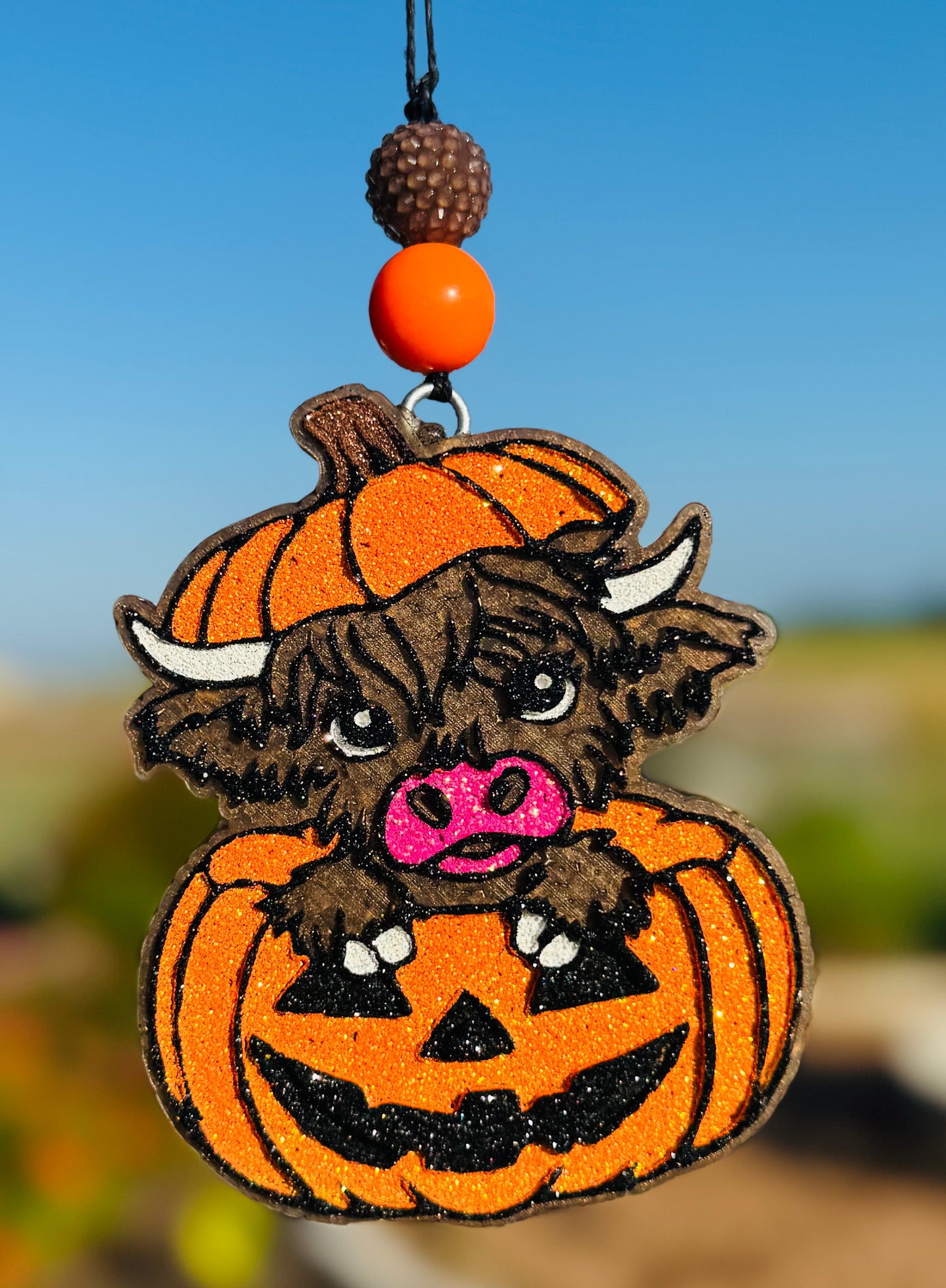 Highland Cow in Jack-O-Lantern