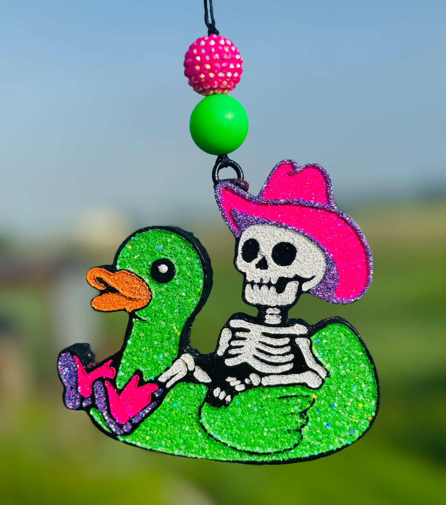 Cowboy Skeleton in Duck Floatie