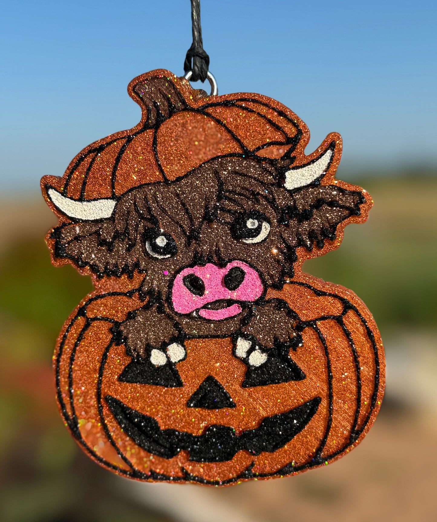 Highland Cow in Jack-O-Lantern