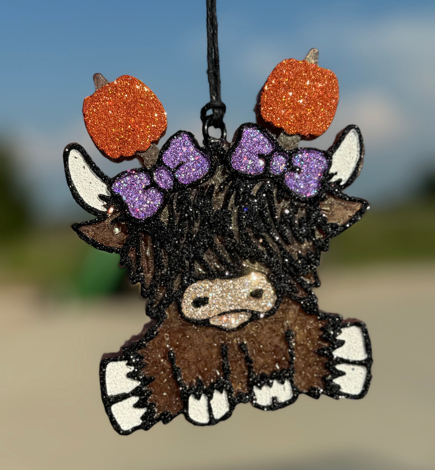 Highland Cow with Pumpkin