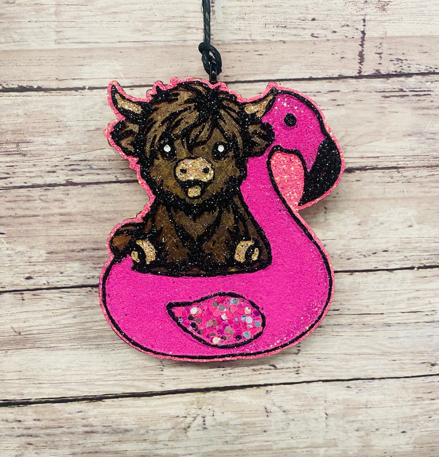 Highland in Flamingo Floatie