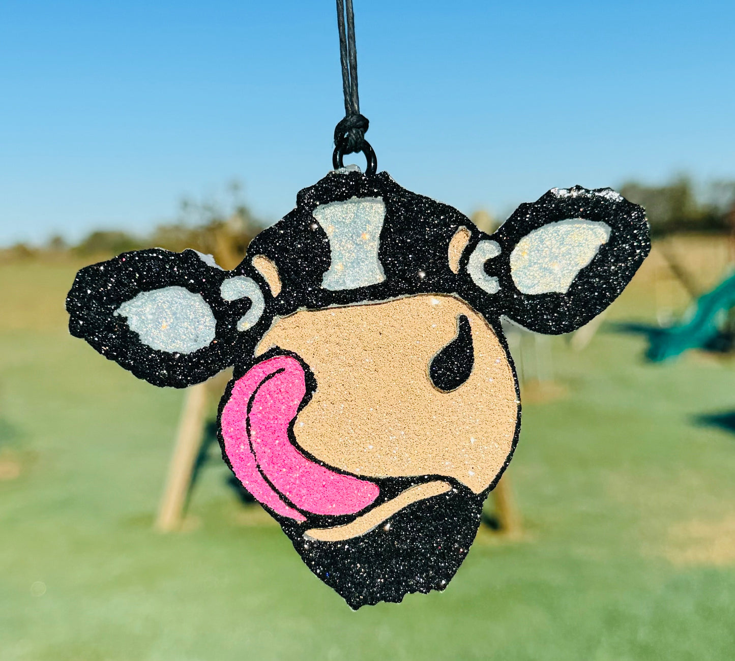 Cow with Tongue Sticking Out