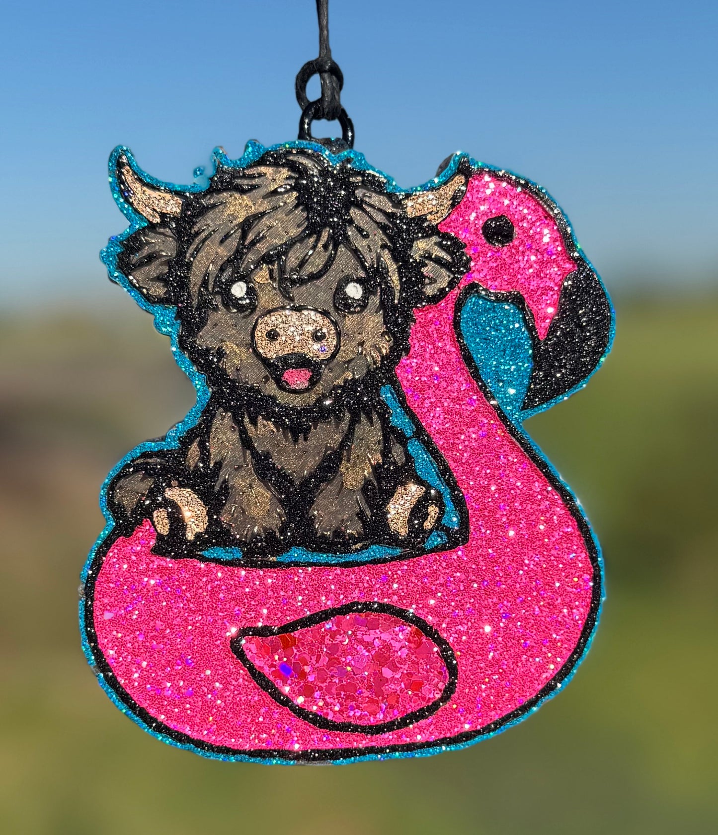 Highland in Flamingo Floatie