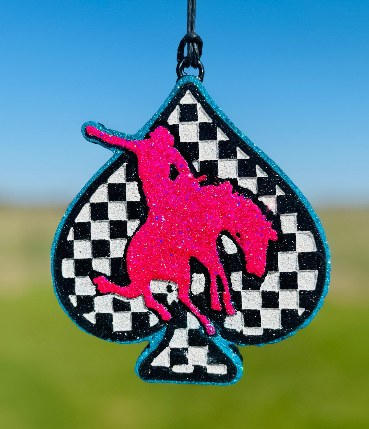 Checkered Spade with Bronc Rider
