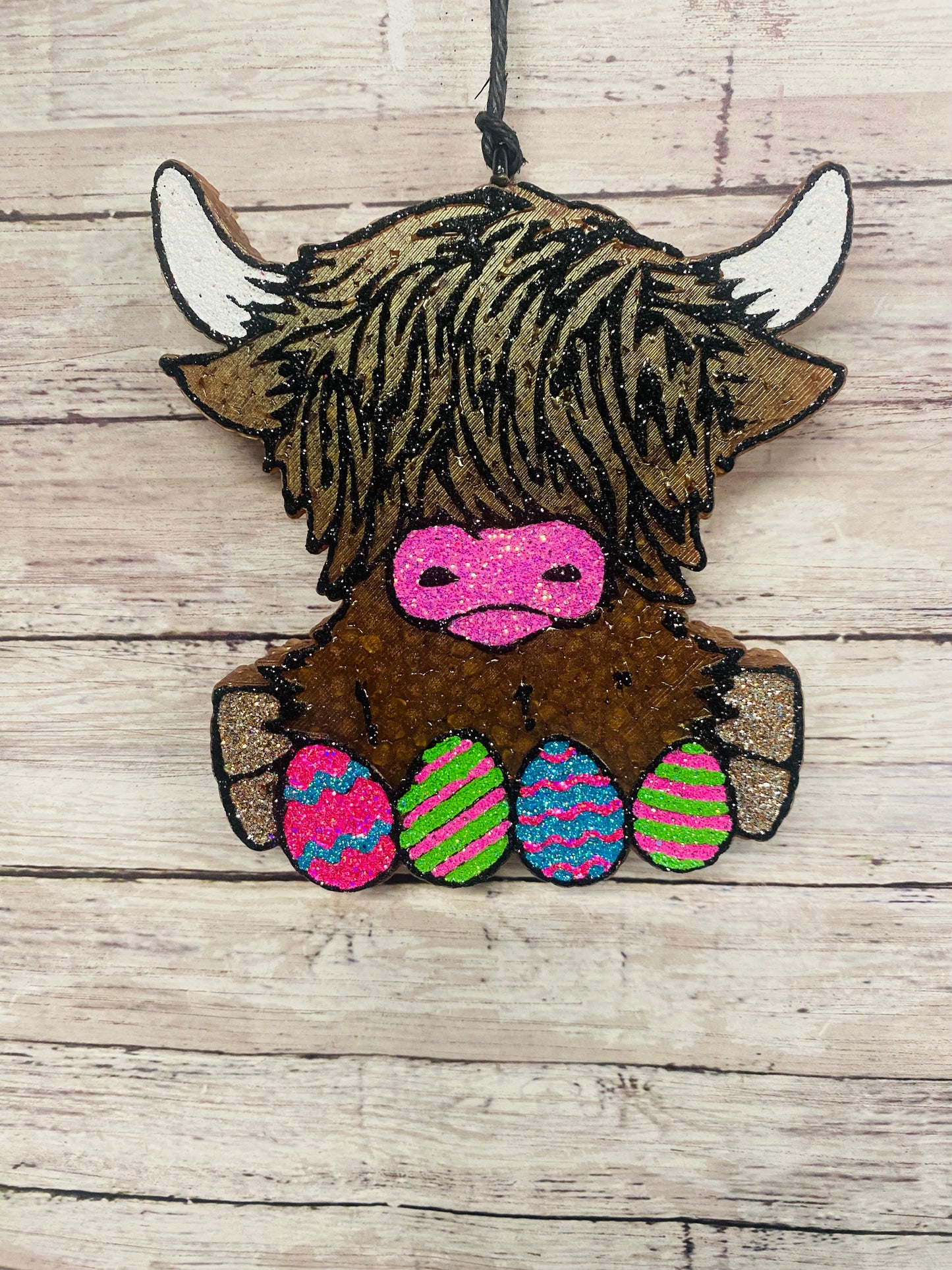 Highland with Easter eggs