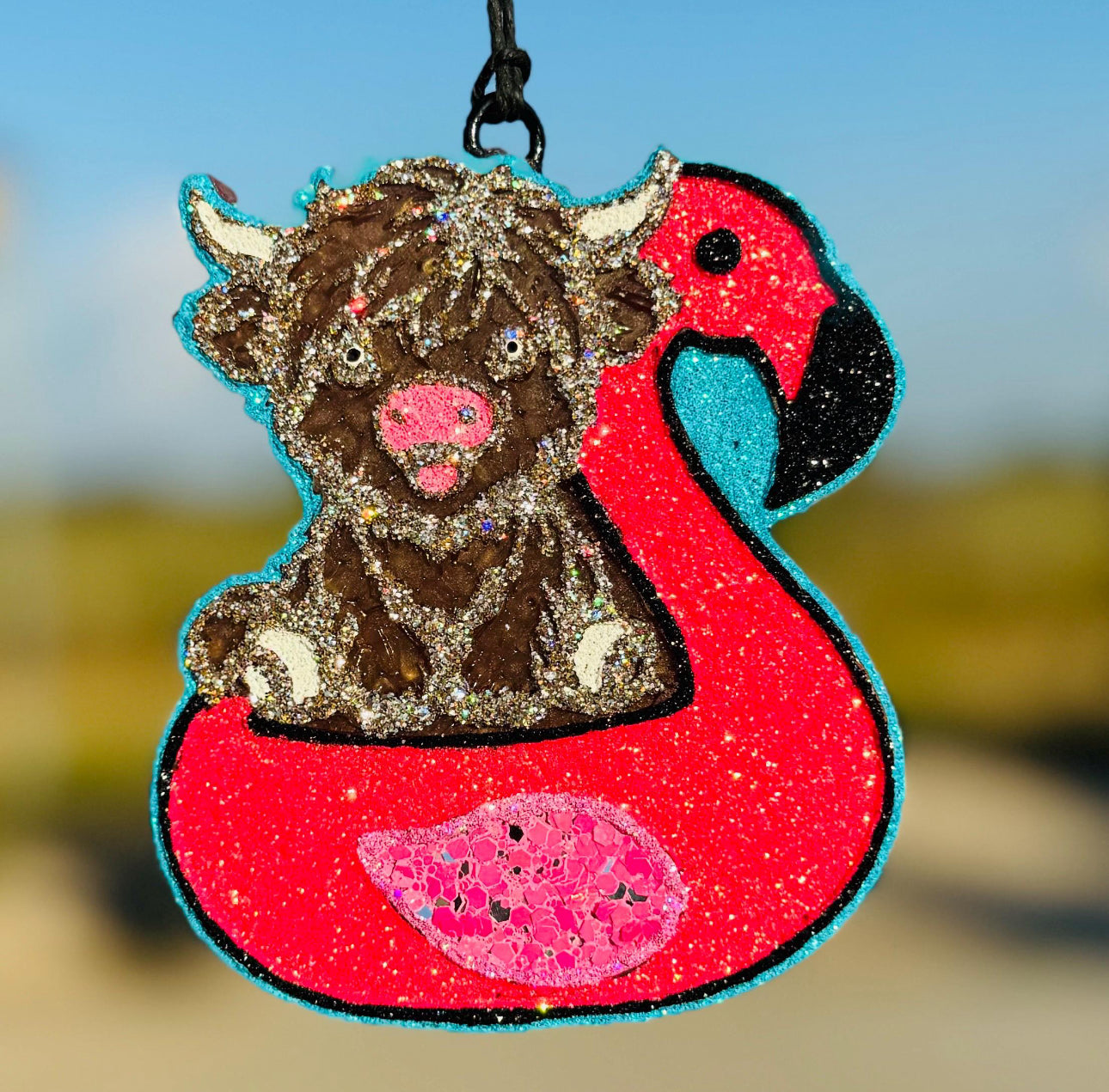 Highland in Flamingo Floatie