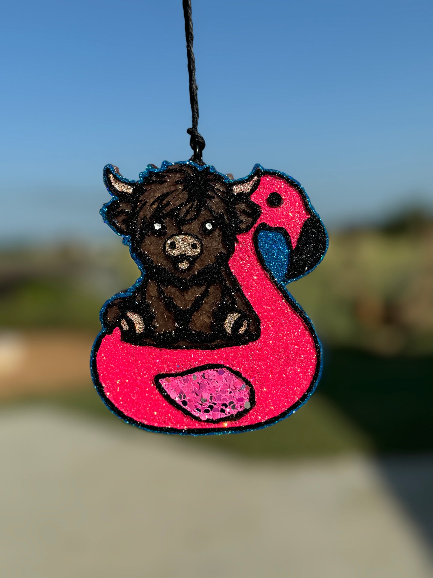Highland in Flamingo Floatie