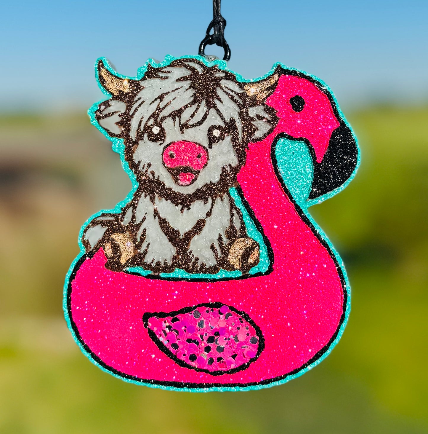 Highland in Flamingo Floatie