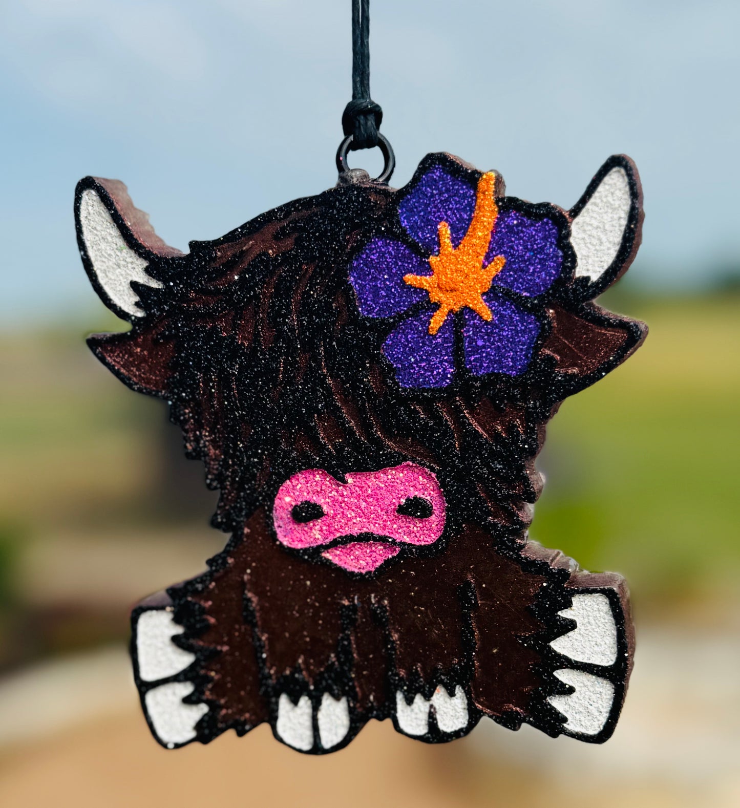 Highland with Hibiscus Flower