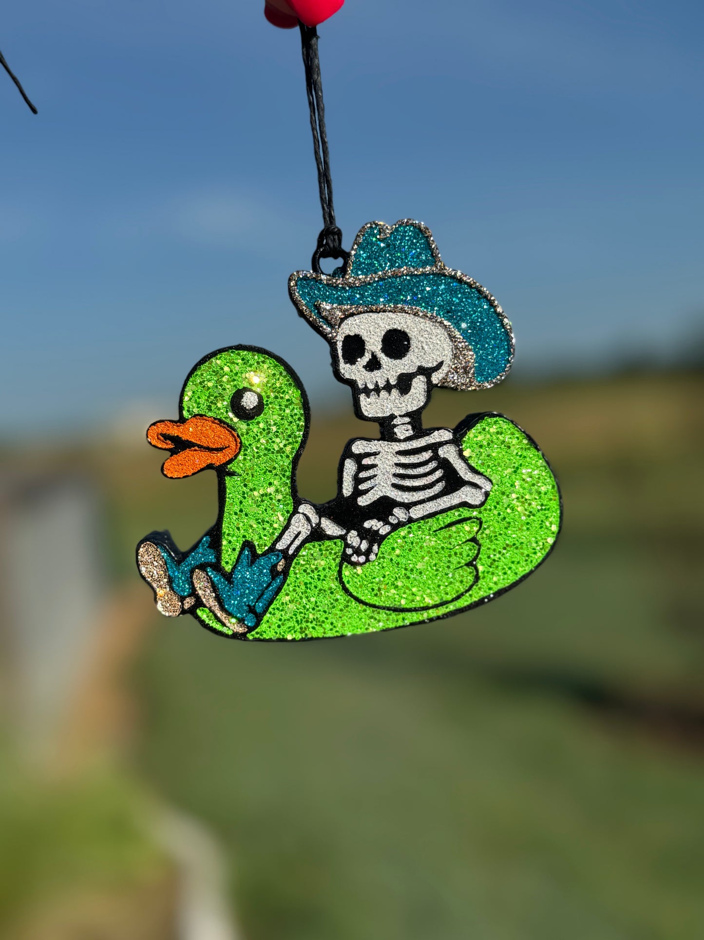 Cowboy Skeleton in Duck Floatie