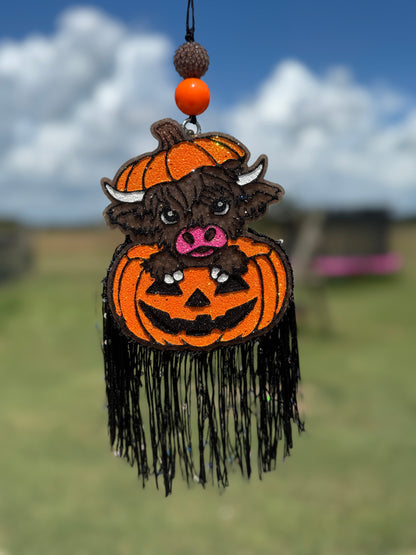Highland Cow in Jack-O-Lantern