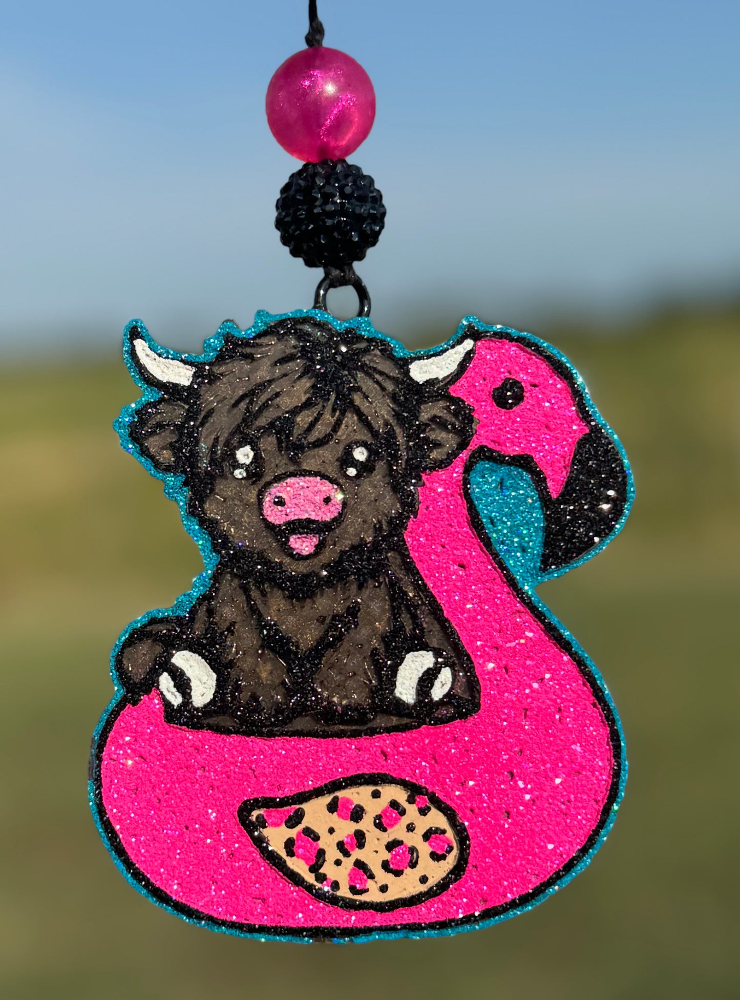 Highland in Flamingo Floatie