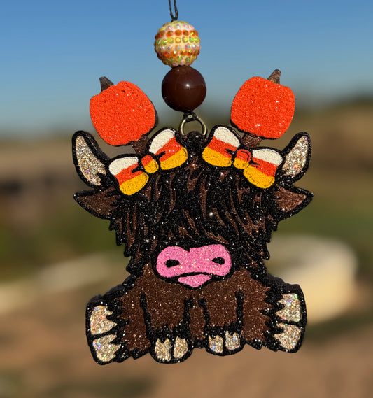 Highland Cow with Pumpkin