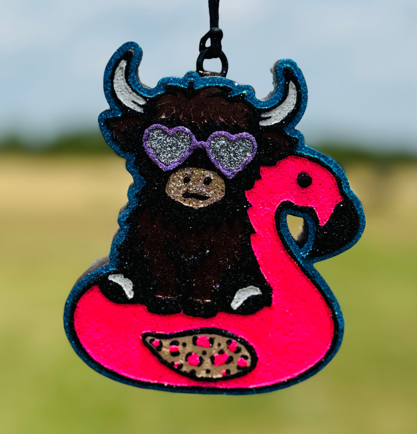 Highland in Flamingo with sunglasses in  Floatie