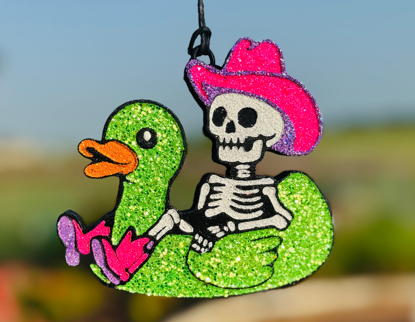 Cowboy Skeleton in Duck Floatie