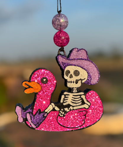Cowboy Skeleton in Duck Floatie