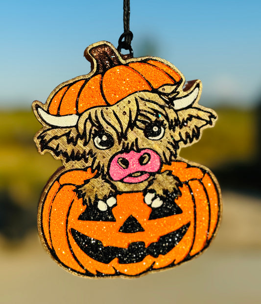 Highland Cow in Jack-O-Lantern