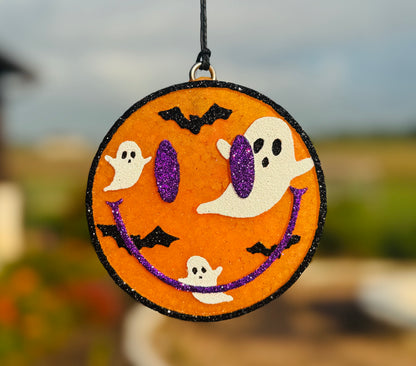 Halloween Smiling Face with bats and ghosts
