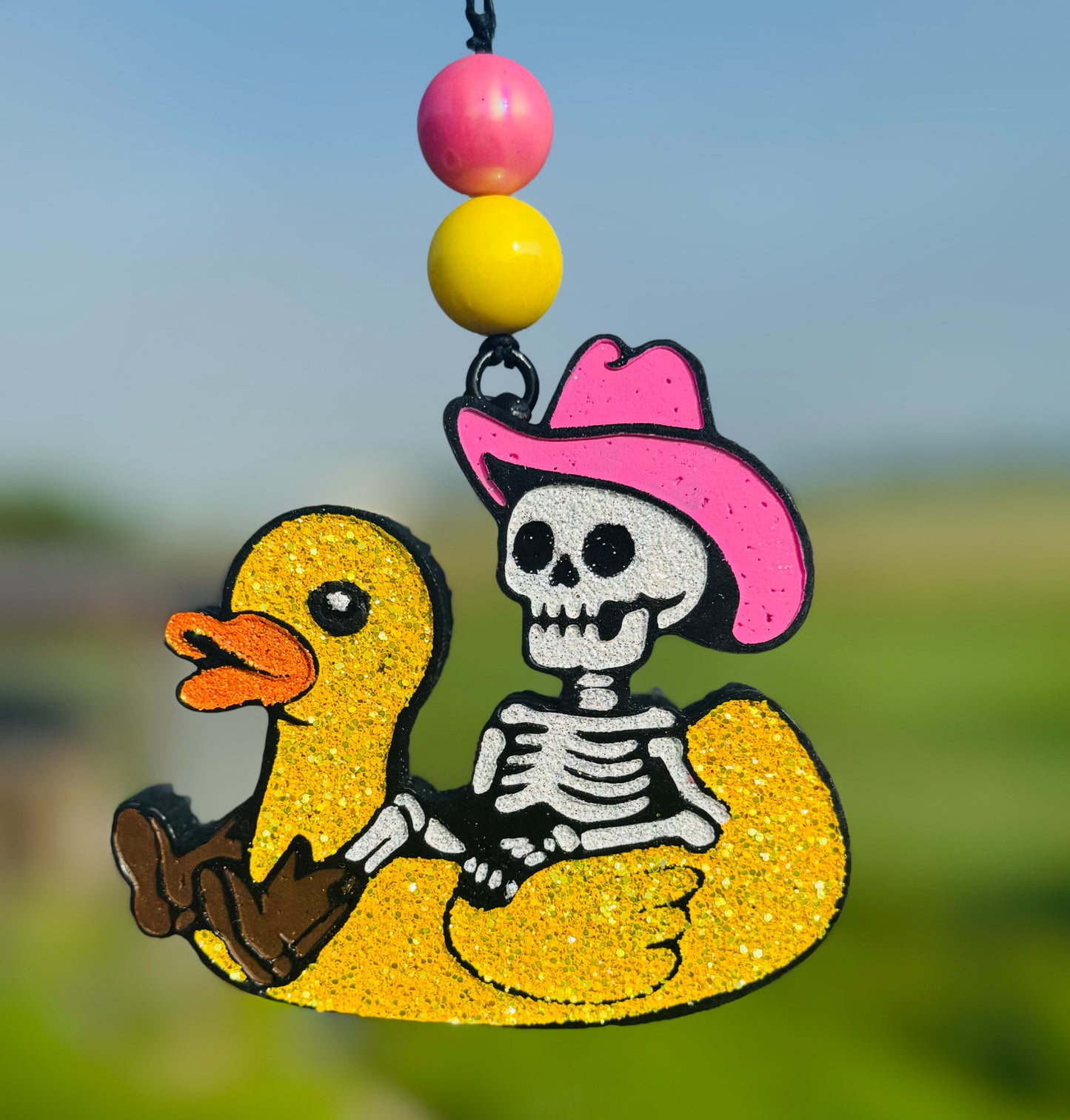 Cowboy Skeleton in Duck Floatie