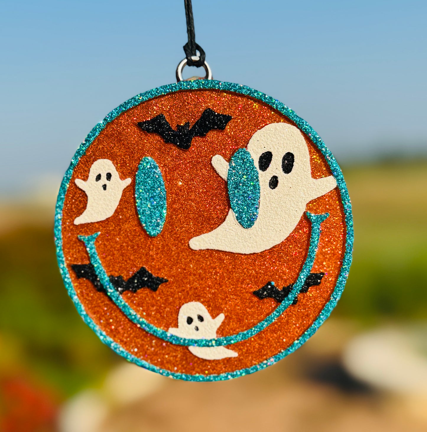 Halloween Smiling Face with bats and ghosts