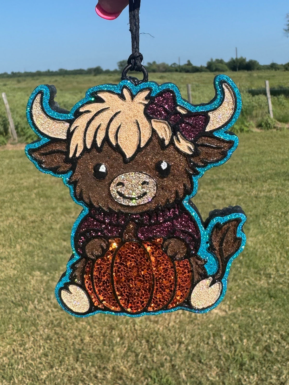 Highland Cow Holding A Pumpkin Option 2