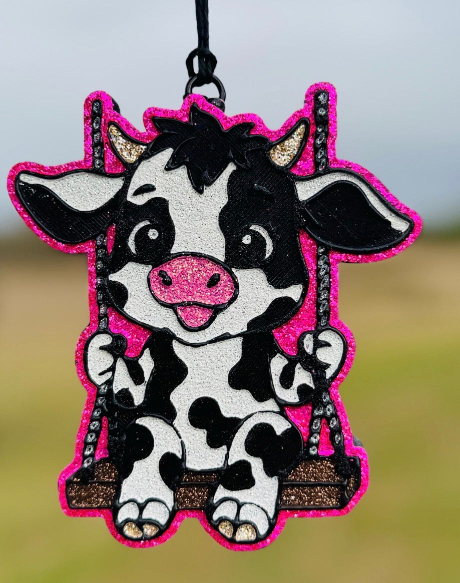 Holstein Cow on Swing