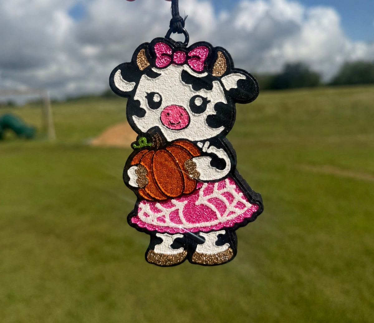 Holstein Girl Holding Pumpkin