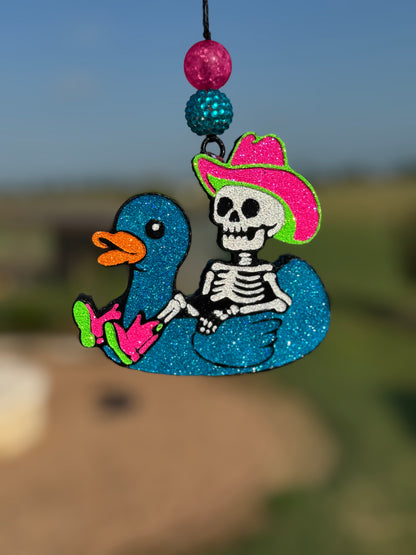 Cowboy Skeleton in Duck Floatie