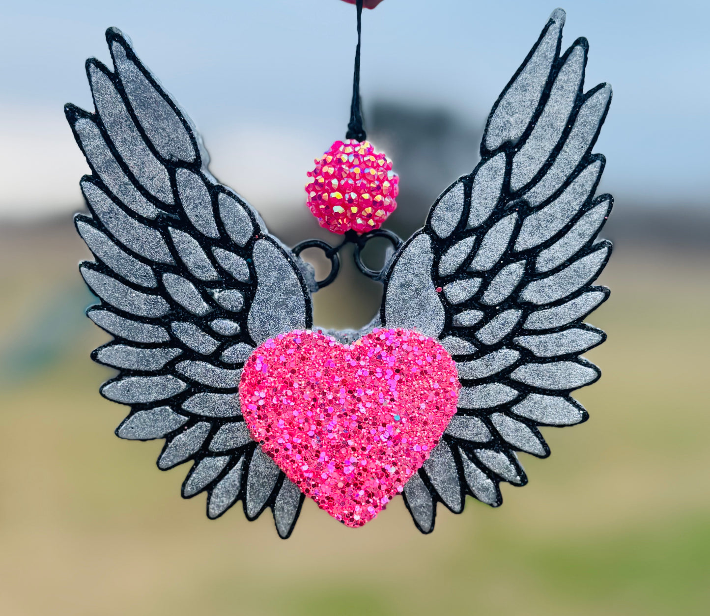 Angel wings with heart