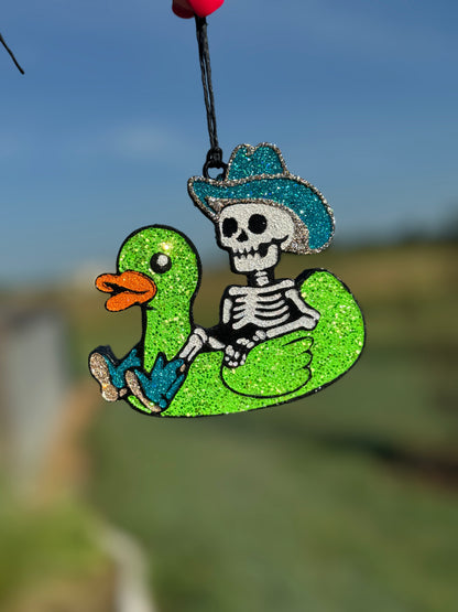 Cowboy Skeleton in Duck Floatie